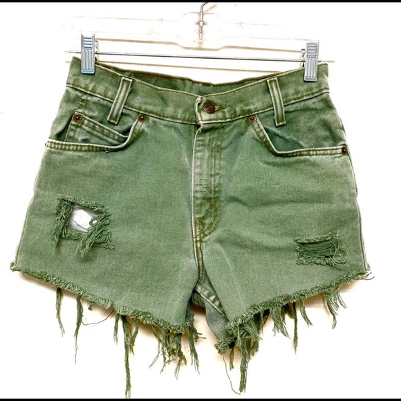 green levi shorts